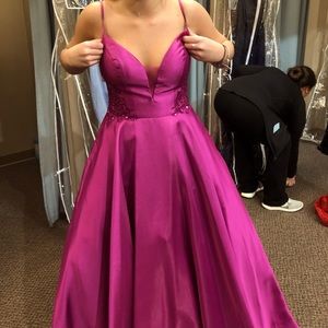 Prom dress with dust bag. Never been worn and great condition!Ask for more pics!